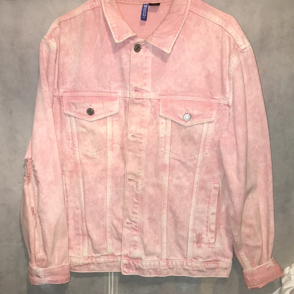 Pink wash distressed denim jacket